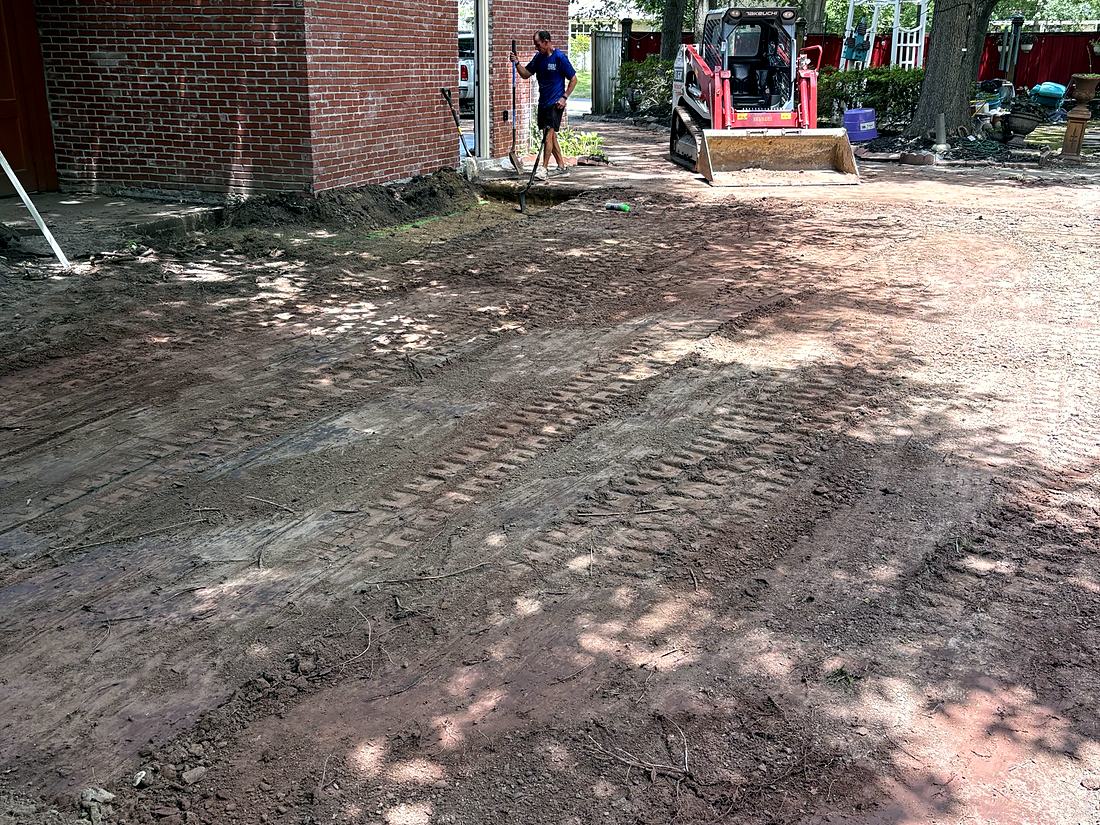 Before: Bare dirt beside the house