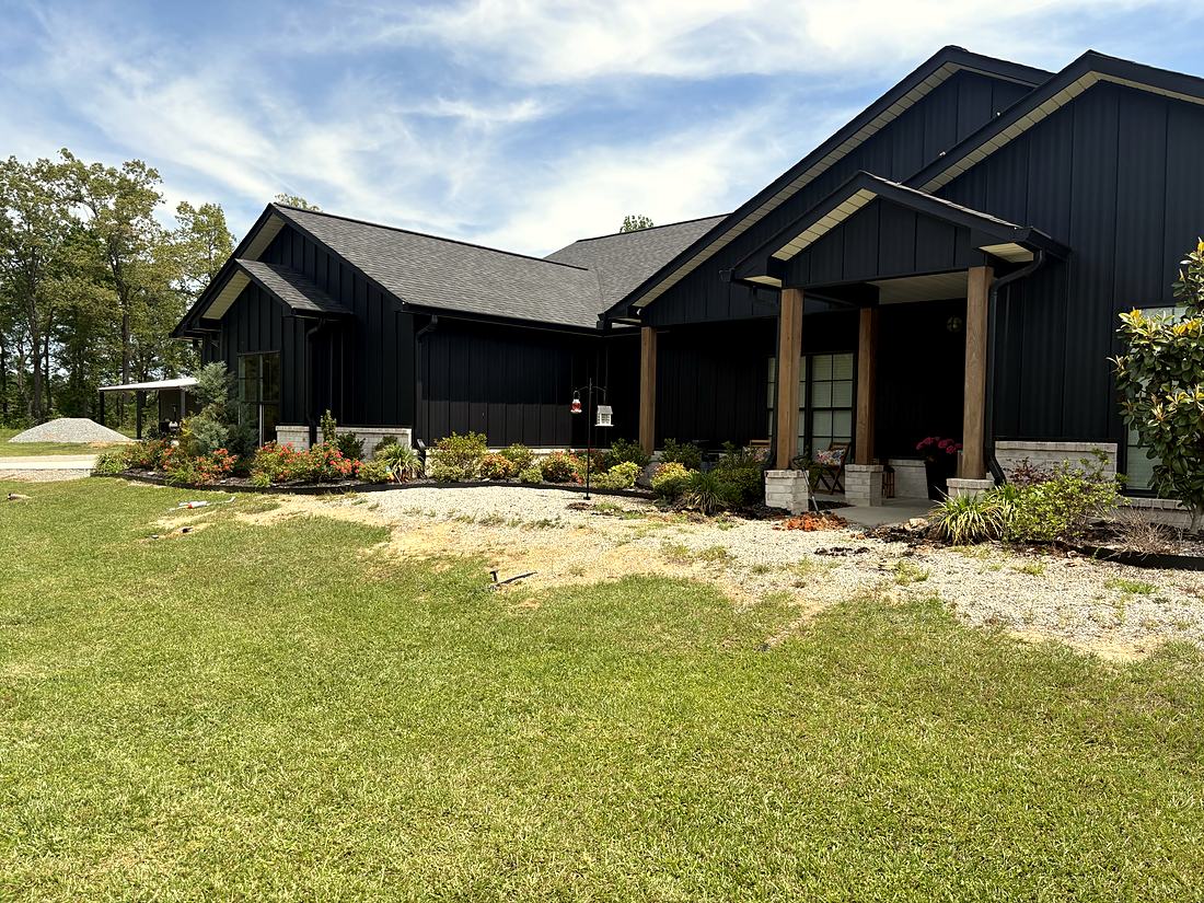 Before: A bare front yard with no walk to the porch